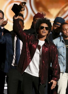 Bruno Mars accepts the award for album of the year for <i>24K Magic</i> at the 60th annual Grammy Awards.