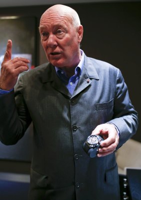 Tag Heuer boss Jean-Claude Biver holds the new Carrera Heuer watch Baselworld.