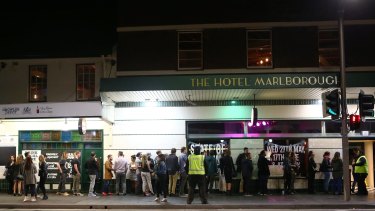 Crowds outside the Marlborough Hotel in Newtown, which is open until 4am.