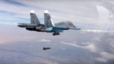 A bomb is released from a Russian Su-34 strike fighter in Syria.