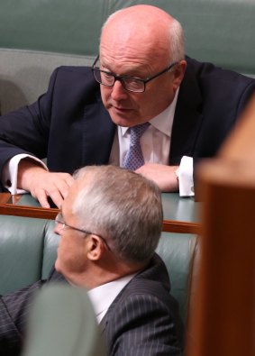 Attorney-General Senator George Brandis with Prime Minister Malcolm Turnbull in Parliament on Monday.