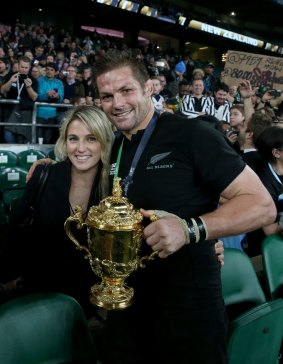 Happy couple: Richie McCaw celebrates with his girlfriend Gemma Flynn.