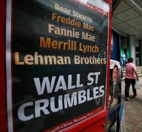 A newspaper headline of US investment bank Lehman Brothers filed for bankruptcy is seen in a Hong Kong street Tuesday, September 16, 2008.