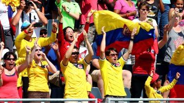 Two for one: Colombia fans celebrate in the second half against France.