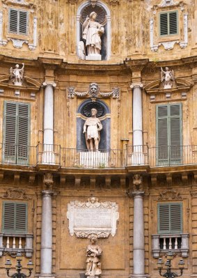 Statue of The Quattro Canti, or piazza Villena, is the name of an octagonal square in the historic center of Palermo with beautiful decorations of the buildings of 1606.