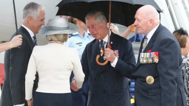 Prince Charles is greeted by Prime Minister Malcolm Turnbull, Lucy Turnbull and Governor-General Sir Peter Cosgrove on his arrival in Canberra on Wednesday.