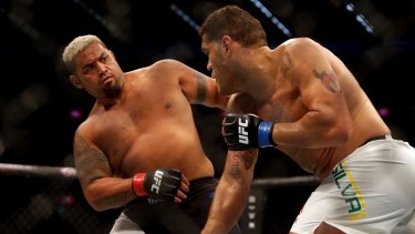 Home-field advantage: Hunt in the octagon with Antonio Silva at UFC 193 in Melbourne.