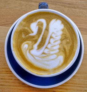 Latte art swans into Macleod.