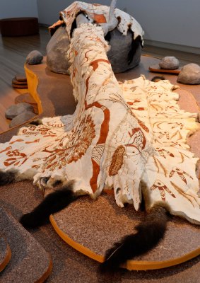 Each cloak has multiple possum skins sewn together.