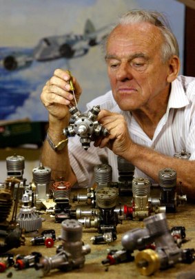Ivor F working on some of his collection of model plane engines at his Doonside home.