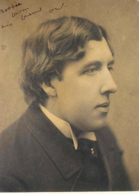 An undated image of Oscar Wilde with his inscription to his companion Robert (Bobbie) Ross. 