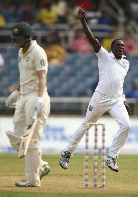 Jerome Taylor was the best of the West Indies' bowlers, here celebrating the wicket of Adam Voges.