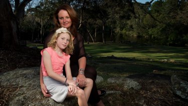 Alisa Kefford Parker with her daughter, Darcy, in Sydney. "This accident was not my fault and it is not right that I am being punished for it."