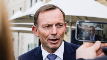 Former Australian prime minister Tony Abbott addresses the media in Hobart.