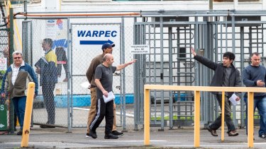 Former Ford workers leaving the Broadmeadows plant at the end of their last shift