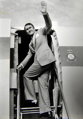 Former prime minister Malcolm Fraser waves farewell from his VIP plane at Fairbairn airport on his way to Japan in 1978.