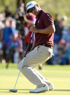 Off day: Adam Scott misses on the 18th hole PGA play-off. 