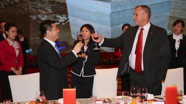 Cheers: Adam Giles, former chief minister of the Northern Territory, toasts Ye Cheng, celebrating the 99-year lease of the Port of Darwin.