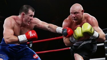 Short and not so sweet: Paul Gallen and Anthony Watts do battle.
