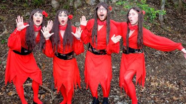 Brisbane Park Awash With Red Dresses For Kate Bush Tribute