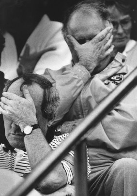 Tough to watch: Despondent Balmain coach Alan Jones (front) and club chief executive Keith Barnes (behind) can't bear to look as Balmain are thrashed by Cronulla at Caltex Field on March 24, 1991.
