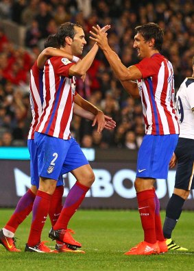 Diego Godin of Atletico de Madrid celebrates after scoring the only goal of the match.