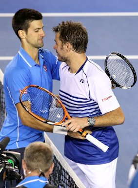 Djokovic consoles Wawrinka after the game.