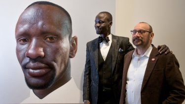 Bearing the scars of time: Artist and subject with the Archibald Prize's 2016 people's favourite. 