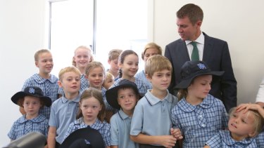 Enjoying an approval rating of 60 per cent: Mike Baird, with the Balgowlah students.