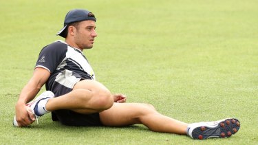 Marcus Stoinis stretches before play during the Sheffield Shield match between Victoria and WA in Alice Springs on Tuesday.