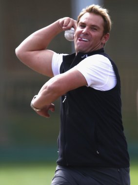 Still got it: Shane Warne rolls his arm over in the nets at Australia's training session on Wednesday.