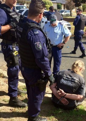 Police say a man arrested on drug and gun charges in Wagga Wagga on Saturday is a sergeant-at-arms of the Rebels outlaw motorcycle gang. 