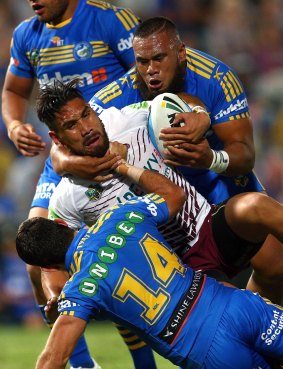 Suspended: Junior Paulo (top) and Isaac De Gois tackle Jesse Sene-Lefao on Friday night.