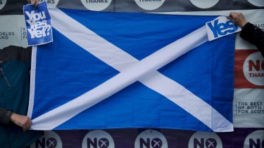 Supporters of Scottish independence in 2014 hold a Scottish flag.