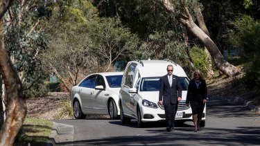 The hearse arrives before Patrick Cronin's funeral at the Whitefrairs College in Donvale. 