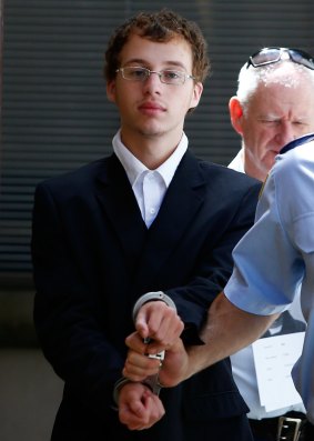 Daniel Jack Kelsall is led into a prison truck after being found guilty of murder.