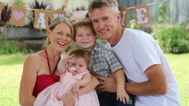 Glenn and Anthea Anderson and their son Lucas, 3, celebrating the first birthday of daughter Elise at their home on the Sunshine Coast of Queensland.