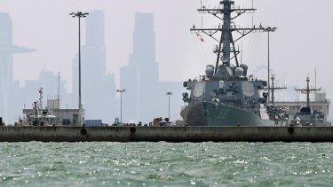 The USS John S. McCain is seen docked at Changi naval base after its accident.