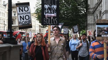 Young protesters walk towards Downing Street to protest against the United Kingdom's decision to leave the EU.
