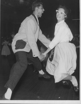 Rock 'N' Rollers Diane Green, of Dutton Park, and Rafino Peoples, of Chermside, warming up in their vigorous bid for the State title at Cloudland ballroom in 1957.