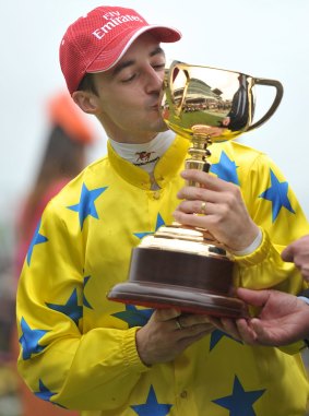 Flashback to 2011: Christophe Lemaire kisses the Melbourne Cup after winning the race on Dunaden.