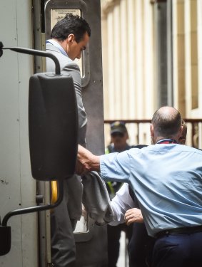 Andrew Lee is taken into court on Friday.