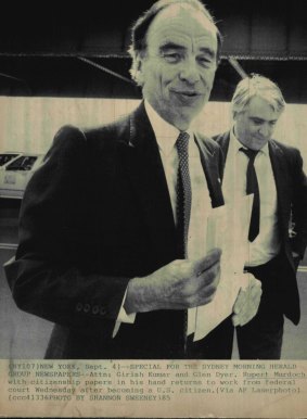 Rupert Murdoch with citizenship papers in his hand returns to work from federal court after becoming a US citizen in 1985. 