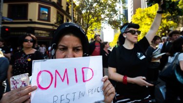 Melburnians protest over treatment of refugees, after the death of Omid.