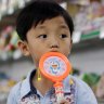 A boy stands in the aisle at the Potonggang department store in Pyongyang, North Korea. Three generations into Kim Jong-un's ruling dynasty, a consumer culture is taking root. 