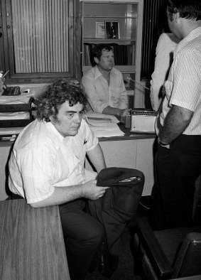 Jimmy Breslin sits at police headquarters in New York after the arrest of David Berkowitz, the Son of Sam serial killer suspect who had contacted Breslin with several cryptic messages during the killing spree. 