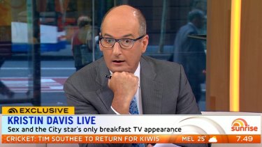 David Koch watches the Sex and the City skit. 