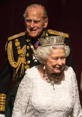  A steady hand in an uncertain world: the Queen  and Prince Philip during the state opening of Parliament in London.
