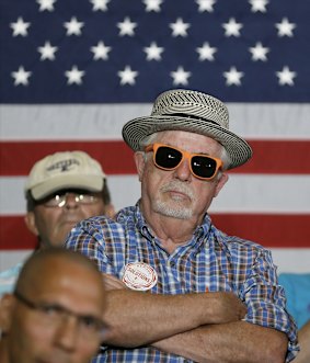 An audience member listens to Democratic presidential candidate Hillary Rodham Clinton on Sunday.