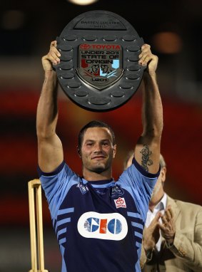 Baby blue: Cordner lifts the winners trophy after the under-20 State of Origin match in Penrith in April, 2012.